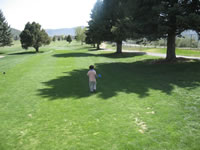 May 2008: Max heading down #10 fairway at Hillcrest in Durango.