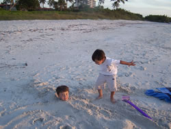 December 2008: Alex buried in sand