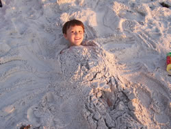 December 2008: Alex just loved to get buried in the sand