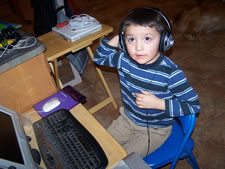 January 2010: Max playing games with headphones