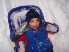 January 2010: Max sledding