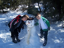 February 2010: Boys with snowman