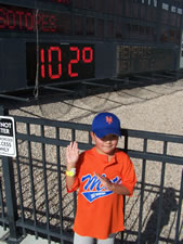 July 2010: Max at the Isotopes, it got up to 104 degrees!