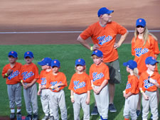 July 2010: Max's tee-ball team was the 'team of the game' at Isotopes park. They got to go out on the field and were introduced. Max is on the far left. 