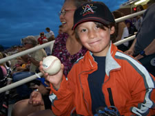 July 2010: Alex and Granmama at the Isotopes. Alex caught a fly ball!