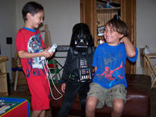 July 2010: Alex and friend laughing with Max Vader.