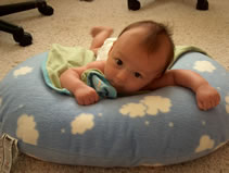 Alex on his tummy in the boppy. (87kb)