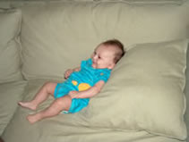 Alex looking at Daddy on the couch. (77kb)