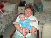 Alex with Jenny West, our wonderful midwife. (118kb)