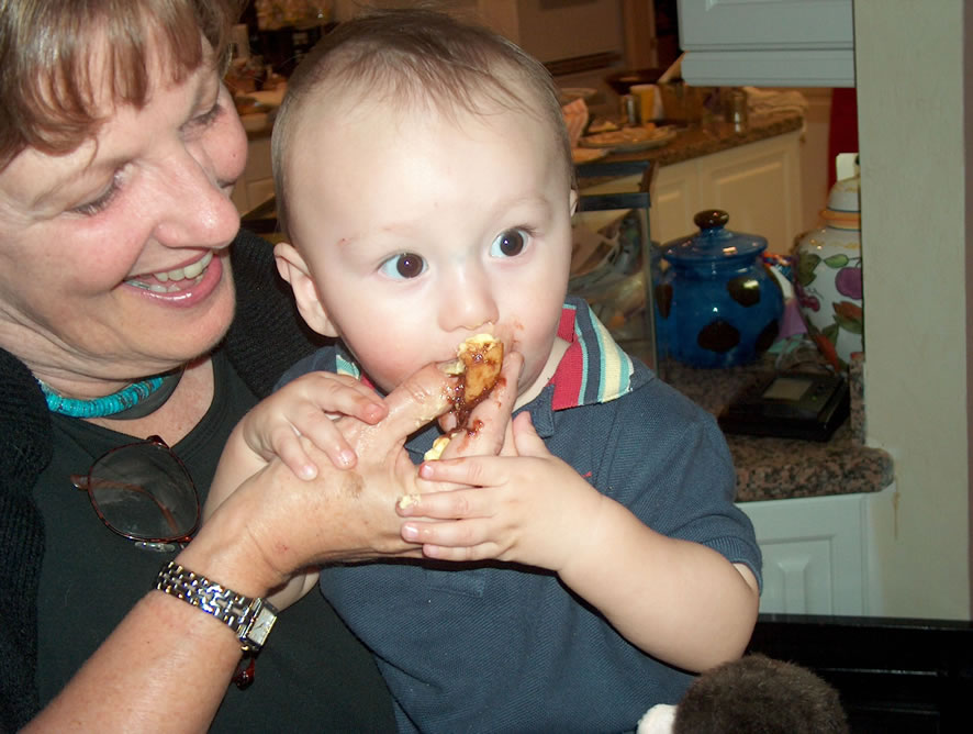 Eating his first eclair. Wow!