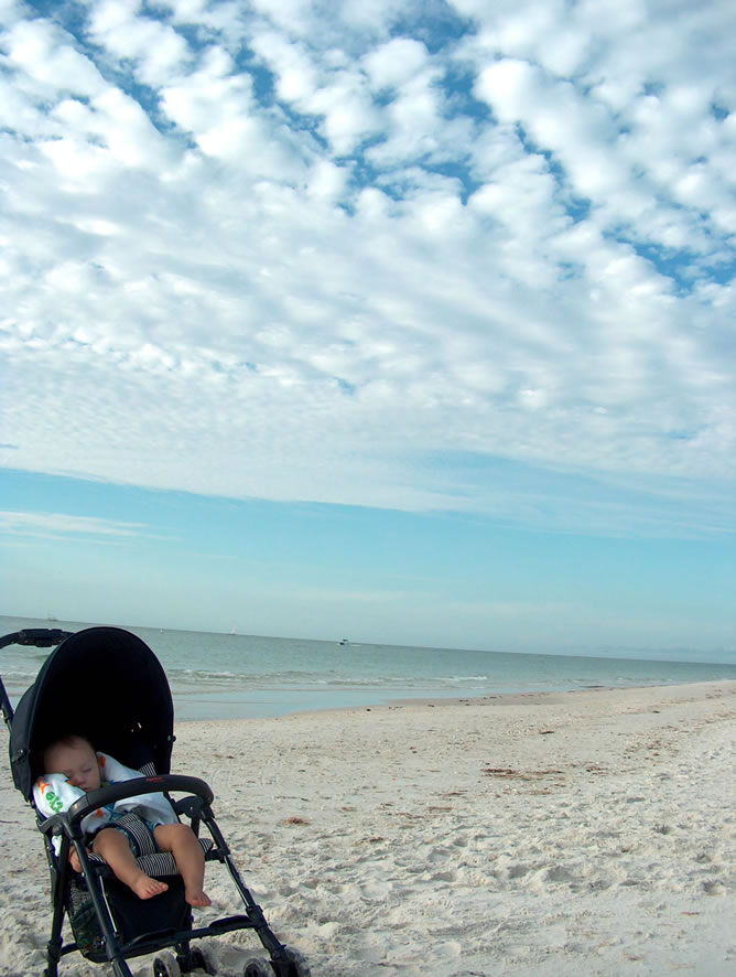 Napping on the beach in Naples.