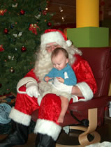 Santa gave Alex his first candy cane (132kb)