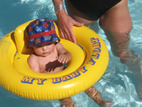 Max in the pool at Alex's party